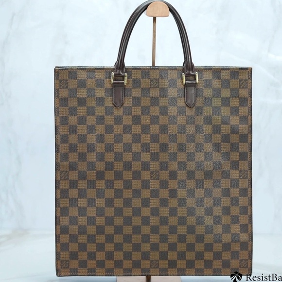 Louis Vuitton Other - LV Sac Plat tote bag in the Damier Ebène canvas and brown leather trim